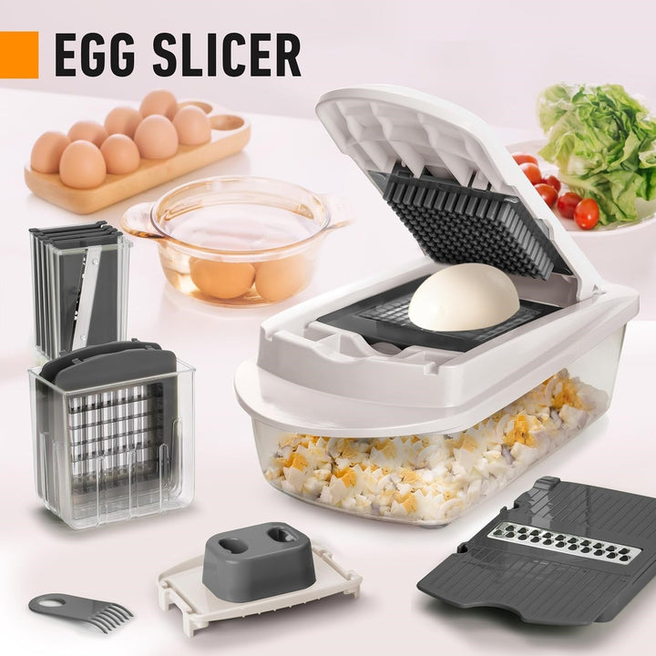 Compact vegetable cutter & food dicing tool with multiple interchangeable blades for versatile kitchen tasks.