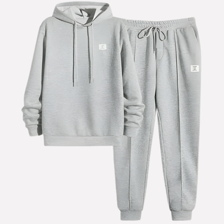 Men's modern jogger tracksuit set. Hoodie & sweatpants, a stylish two-piece for casual and athletic looks.