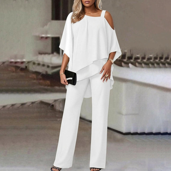 Chic women's asymmetric top and straight leg pants matching set, perfect for office or evening.
