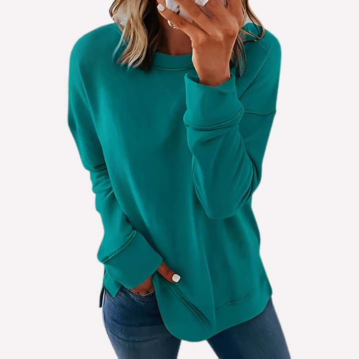 Cozy women's relaxed fit crew neck sweatshirt, a must-have long sleeve for loungewear.