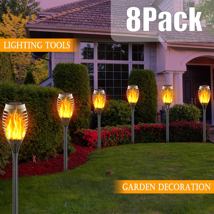 Durable outdoor solar lights, 8-pack, providing wireless flame effect landscape lighting.