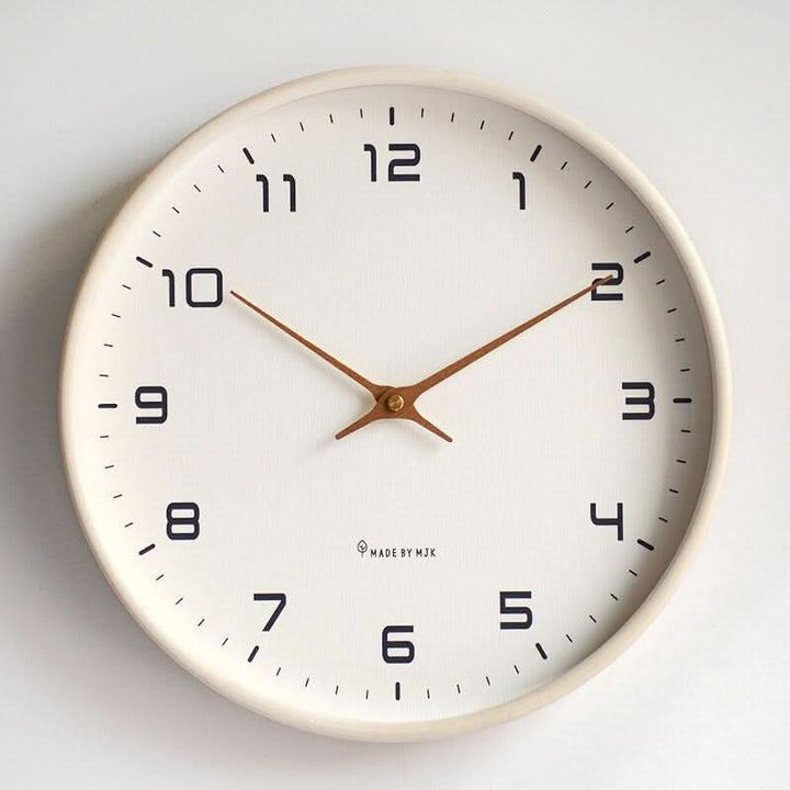 Silent quartz Scandinavian wooden wall clock, minimalist beige design. Modern home decor for living room or office.
