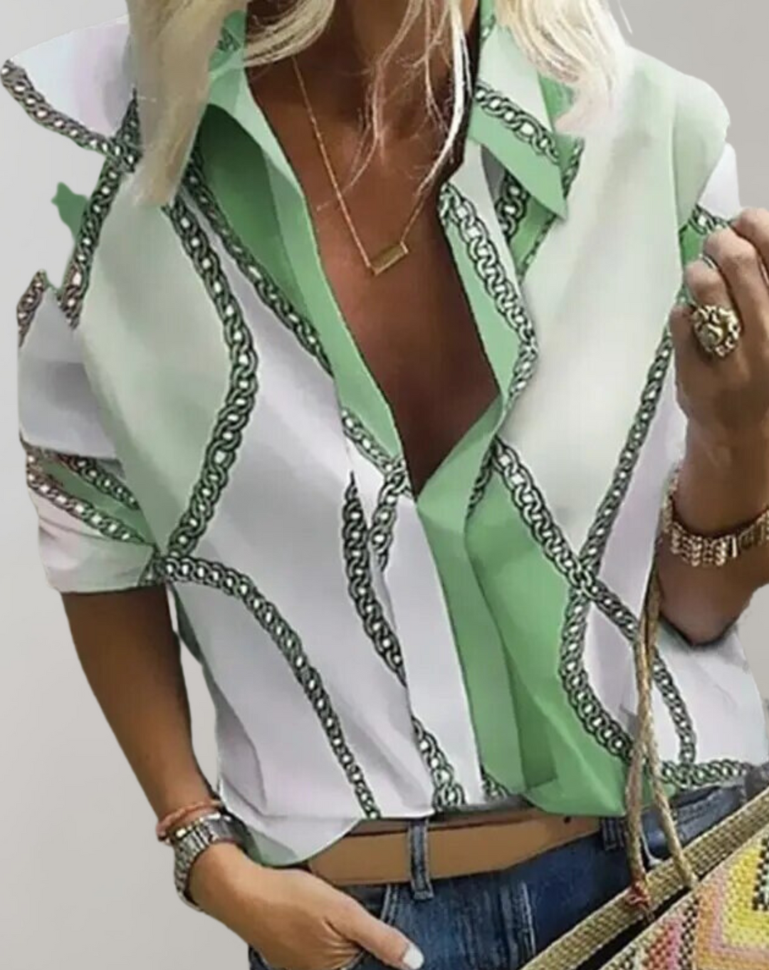 Elegant women's long sleeve blouse with a chic gold chain pattern, perfect for office or business casual wear.