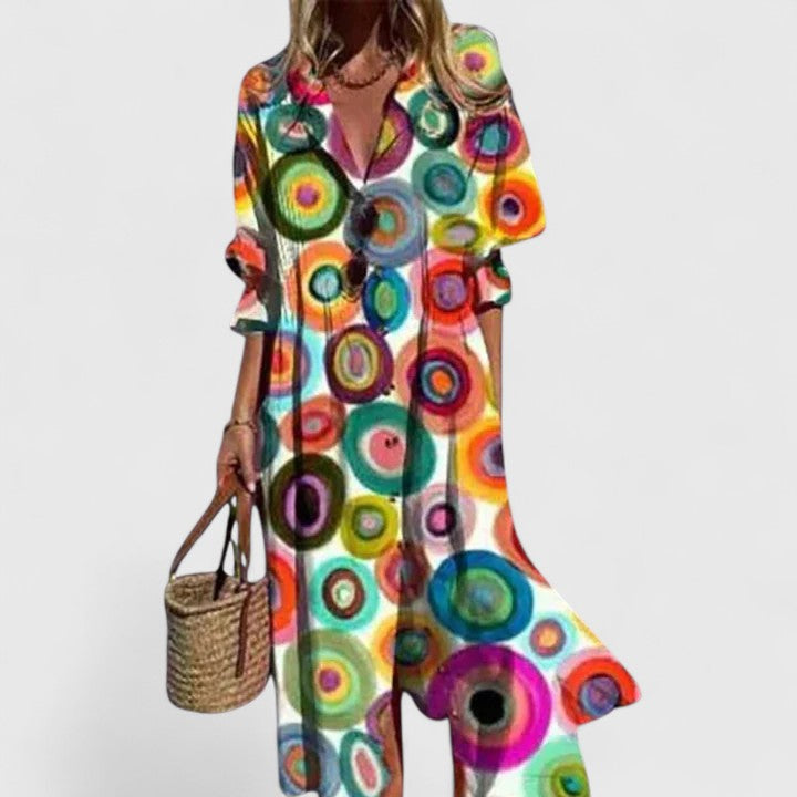 Women's elegant long sleeve botanical print maxi dress, flowy and comfortable for boho style.
