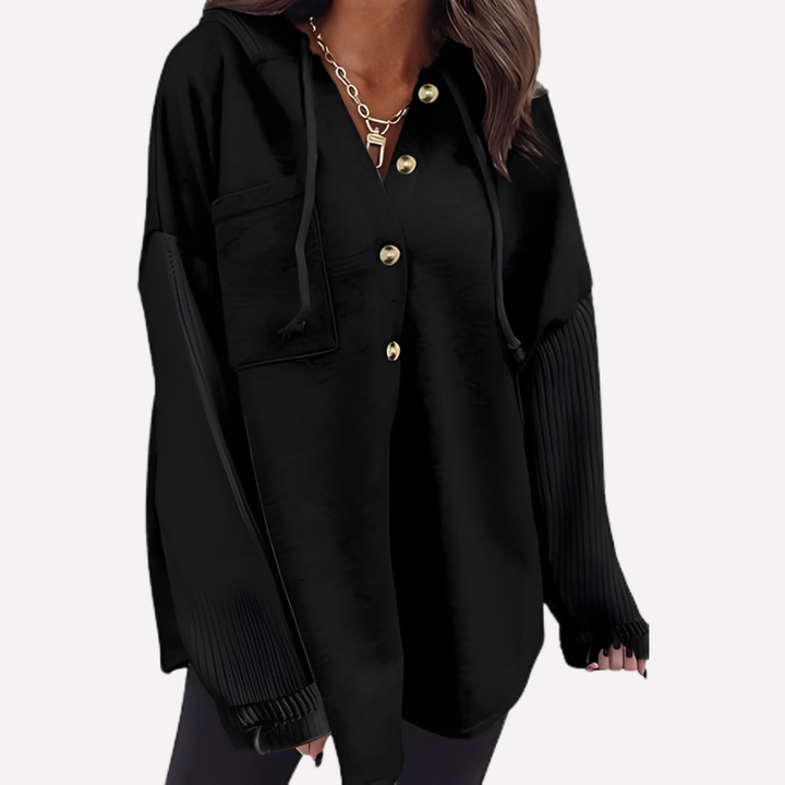 Oversized women's sweatshirt with button-front closure & hood. Stylish long sleeve for casual wear.