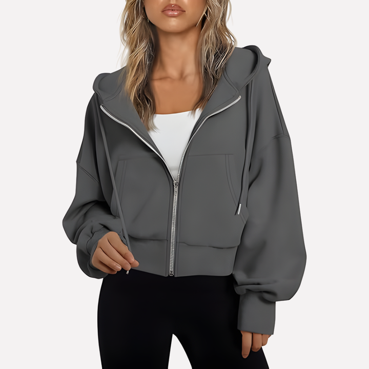Oversized graphic pullover sweatshirt for women. Relaxed fit, comfortable long sleeve casual wear.