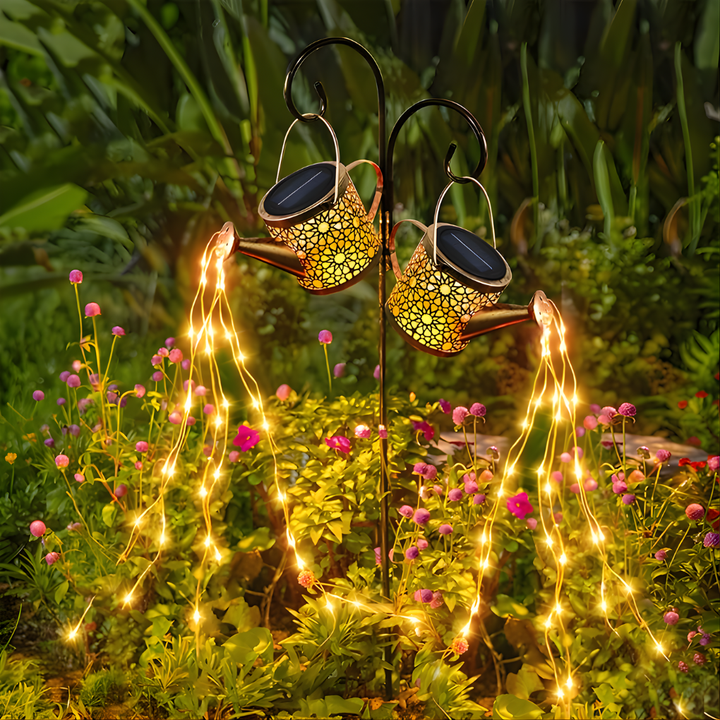 Elegant iron solar garden stake lights, warm white outdoor decor for illuminating paths & gardens at night.