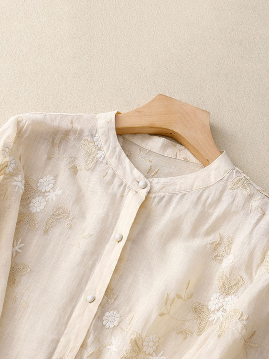 Effortless women's long sleeve blouse, embroidered top with floral patterns, versatile casual wear.
