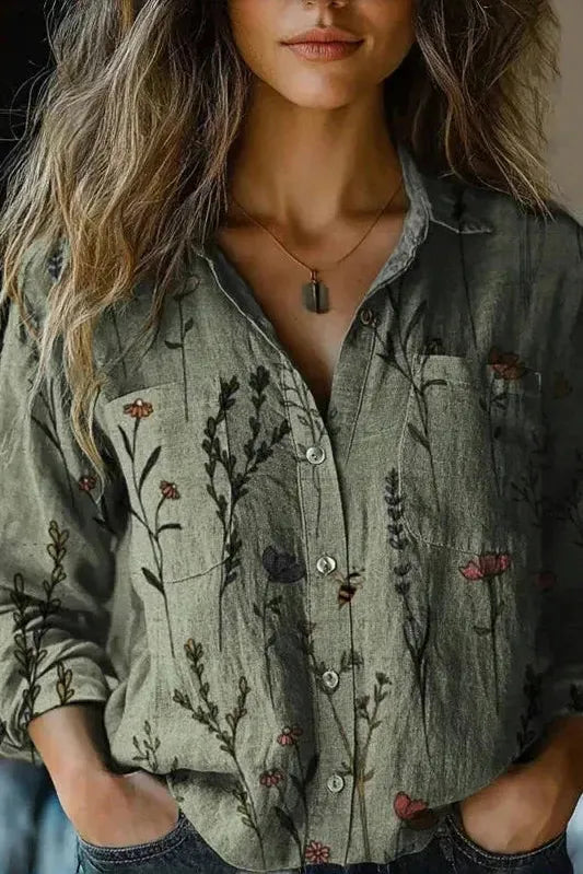 Stylish blue long sleeve blouse for women. Elegant and comfortable relaxed fit top for everyday wear or office workwear.