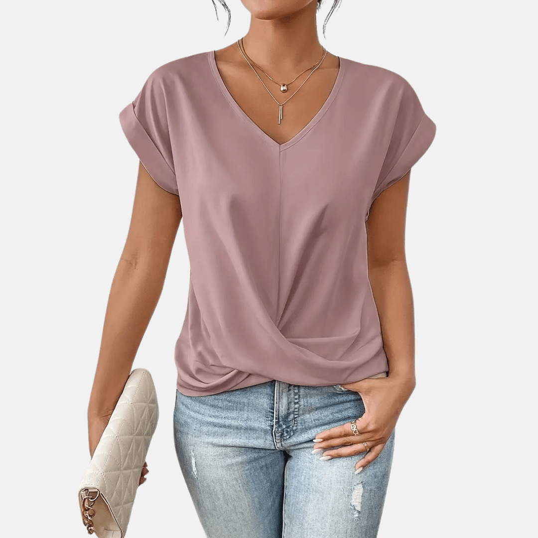 Effortless women's V-neck blouse with a flattering draped hem and short sleeves for summer fashion.