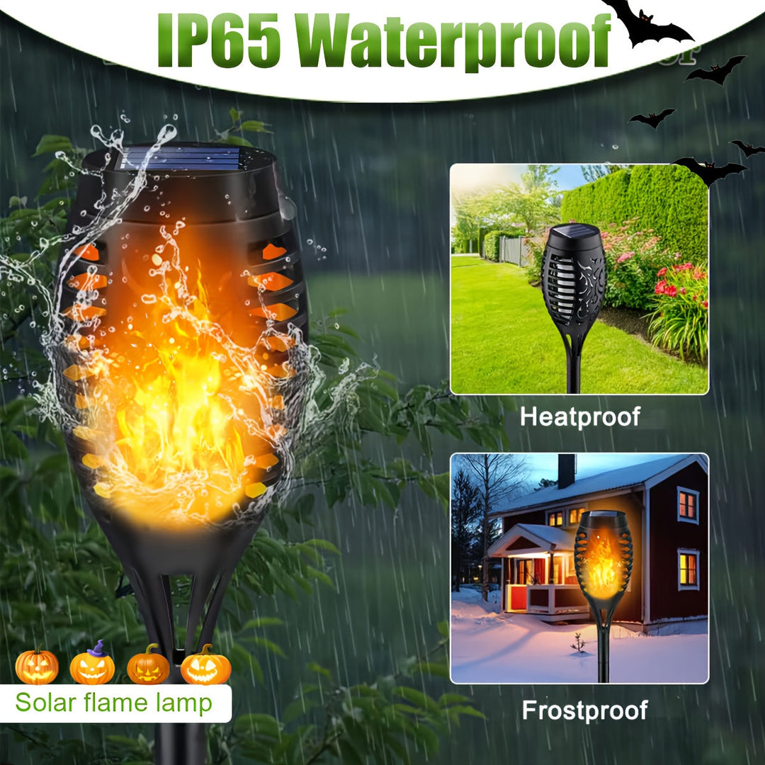 Close-up of a single solar LED light with a bright, dancing flame effect for outdoor decor.