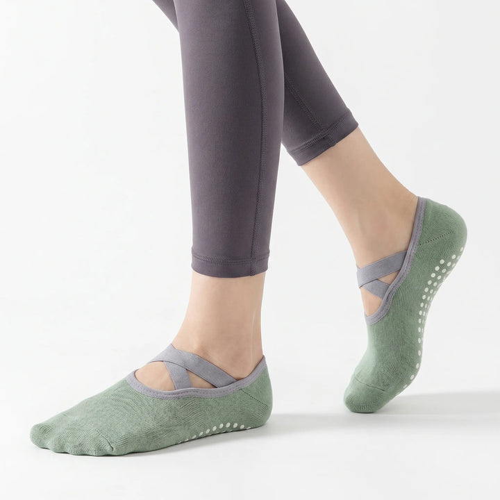 Non-slip green grip socks for women, perfect for ballet, dance, yoga, and barre workouts.