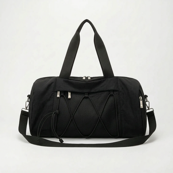 Lightweight unisex duffel bag for gym & travel, designed for easy carry of sports and activewear essentials.