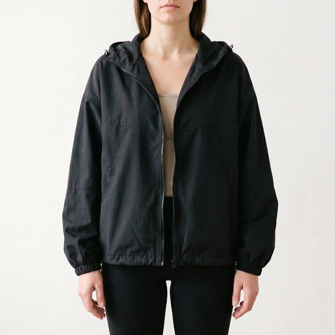 Stylish women's hooded windbreaker. Lightweight, loose fit jacket offers all-day comfort & weather resistance for casual wear.