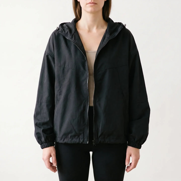 Stylish women's hooded windbreaker. Lightweight, loose fit jacket offers all-day comfort & weather resistance for casual wear.