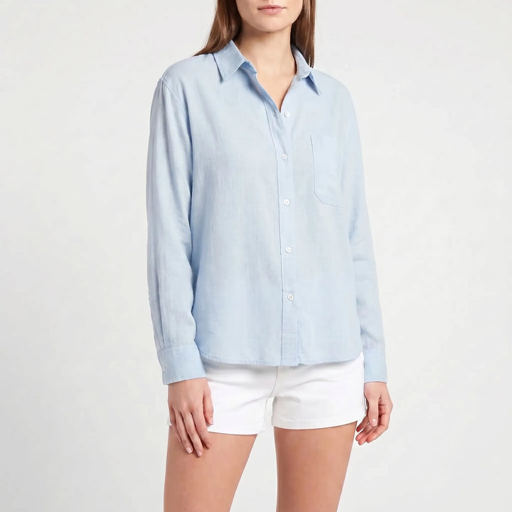 Classic women's long-sleeve button-up blouse, great for a smart casual or relaxed look.