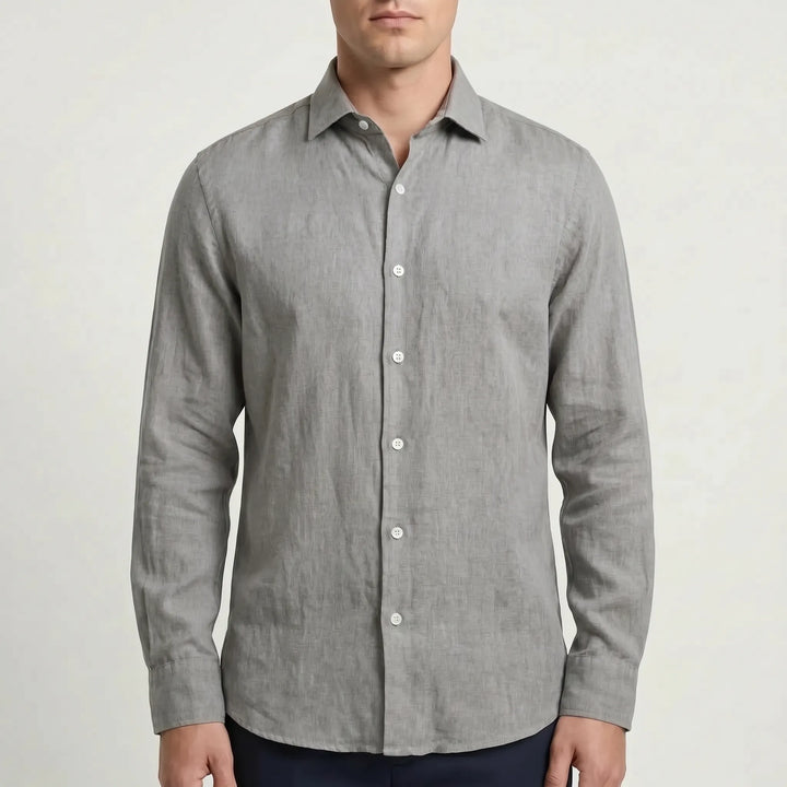 Men's relaxed fit long-sleeve button-up shirt, a solid color staple for summer, travel & casual wear.