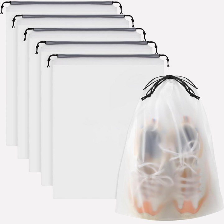 Clear drawstring travel bags for shoe storage, keeping clothes clean in luggage. Set of 5 organizers.