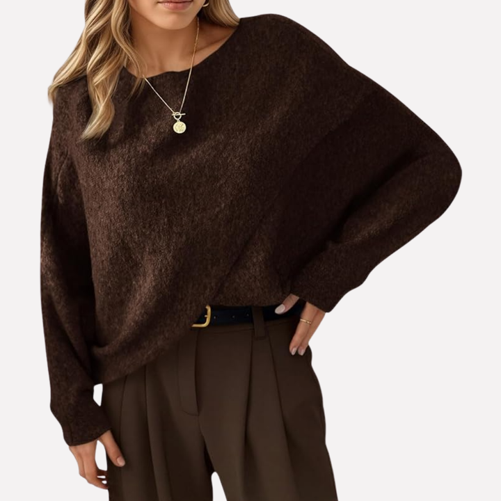 Relaxed fit women's batwing sweater with asymmetrical hem & comfy crew neck. Great for everyday casual autumn wear.