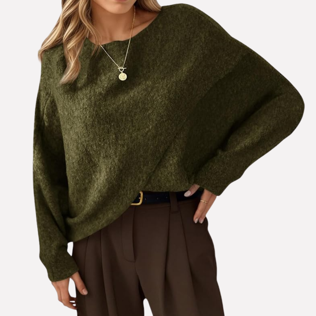 Cozy women's oversized batwing sweater, perfect for autumn & winter. Features long sleeves & relaxed fit for comfort.