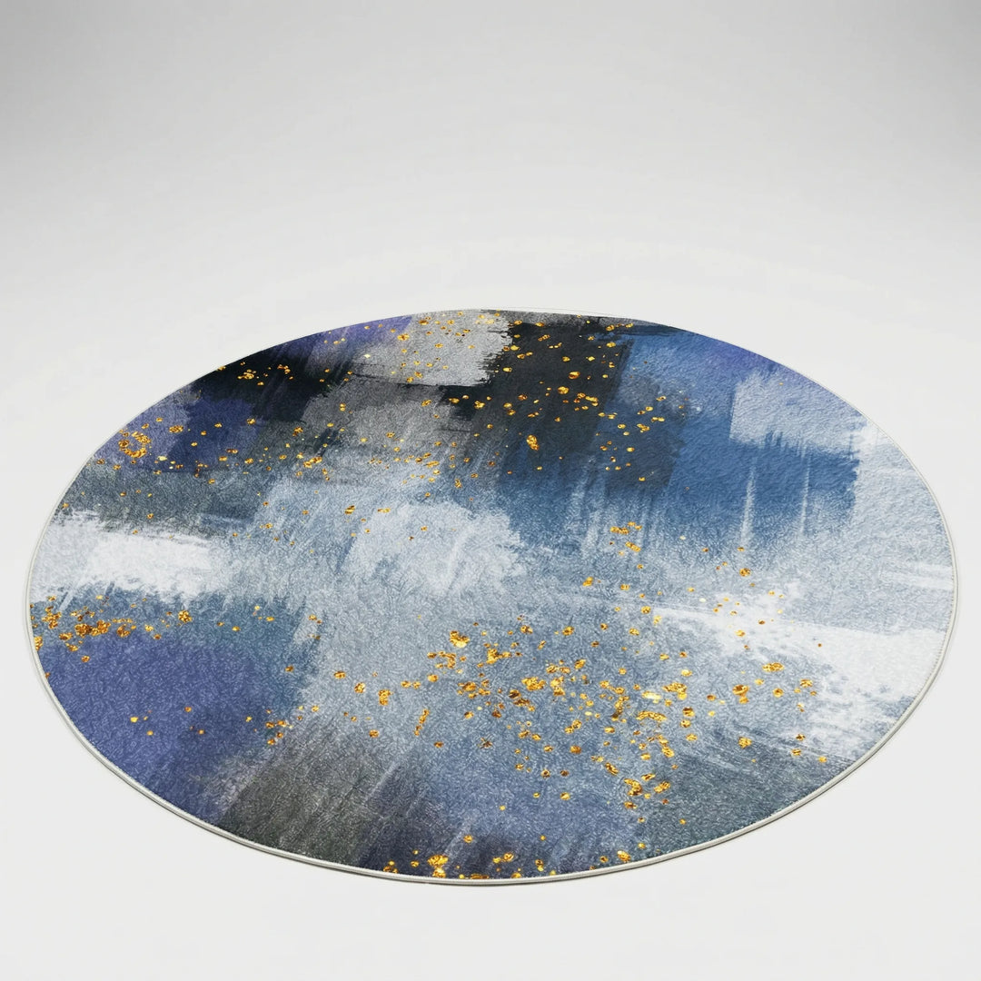 Washable non-slip Flowique abstract round area rug. Blue & gold boho wave design perfect for kitchen or entryway.
