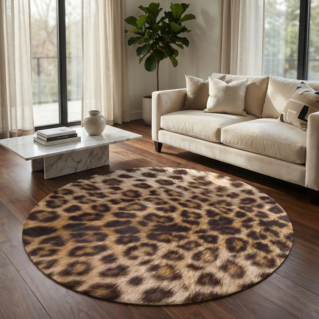 Round leopard print area rug. Soft, patterned accent rug for stylish living room or bedroom home decor.