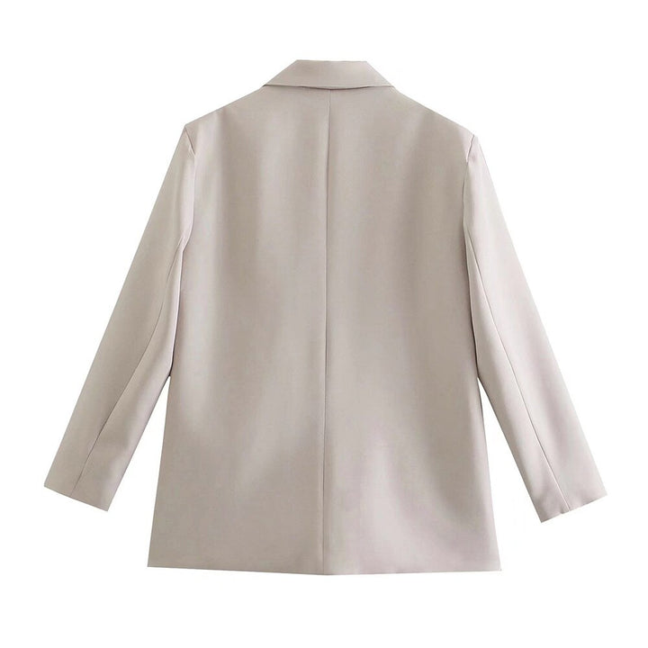 Classic double-breasted women's blazer, enhancing a professional and polished look.