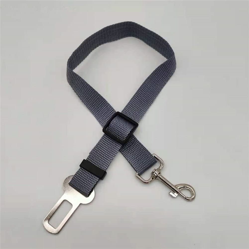 Car safety seatbelt for dogs. Adjustable pet restraint ensures secure travel and prevents distractions while driving.