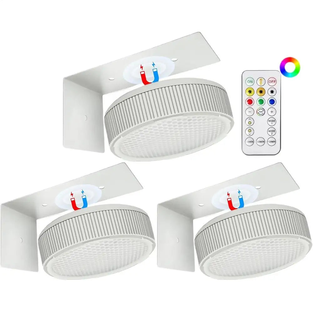 Set of 3 adjustable LED art lamps, remote-controlled & dimmable for wireless picture & wall accent lighting.
