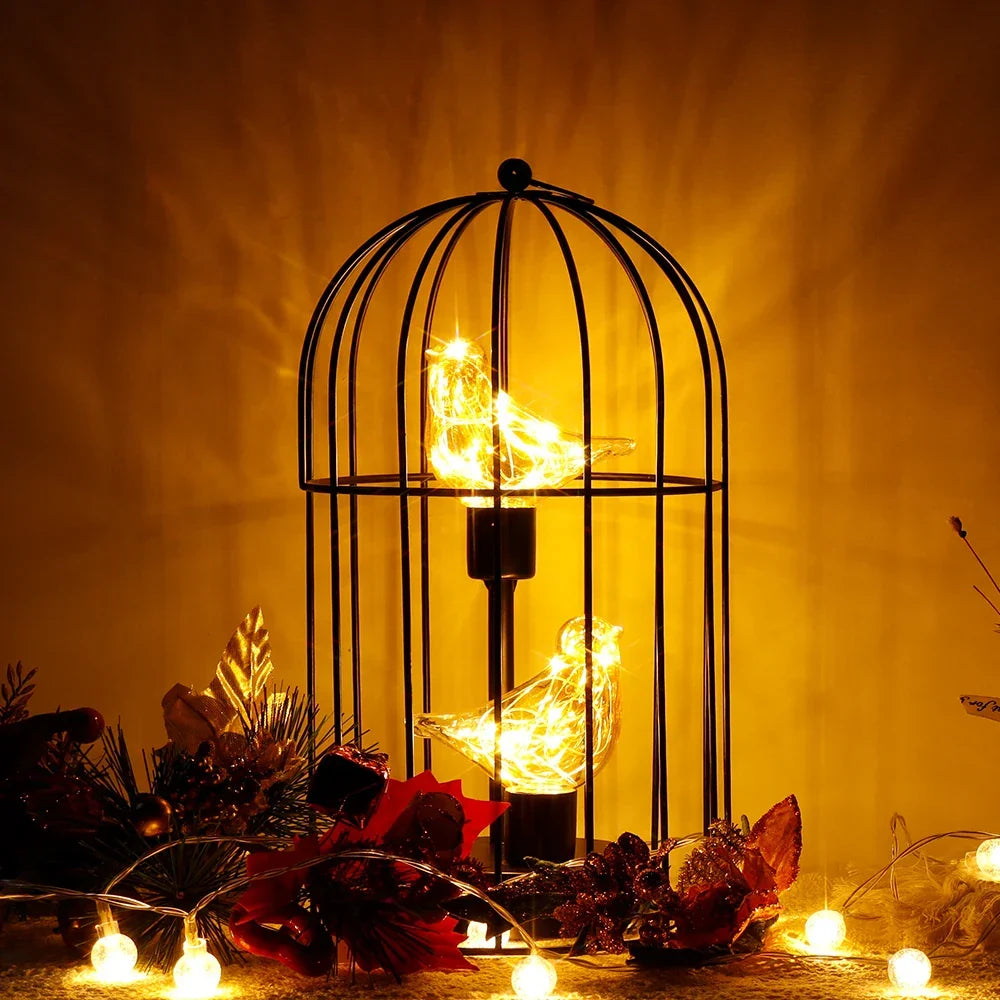 Enchanting fairy light LED birdcage lamp, creating a soft romantic glow for any room.