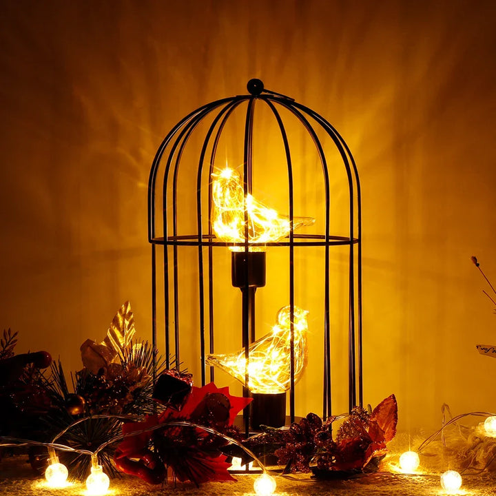 Enchanting fairy light LED birdcage lamp, creating a soft romantic glow for any room.