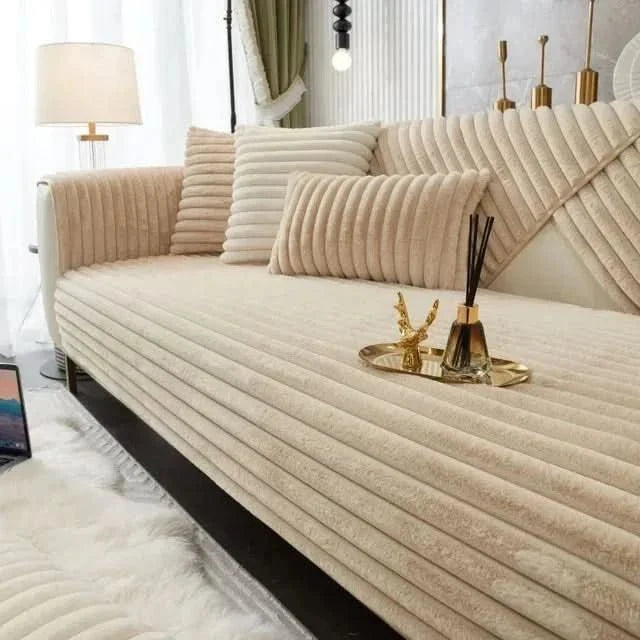 Comfortable, solid color couch cover for home decor. This waterproof, non-slip furniture protector keeps your sofa clean.