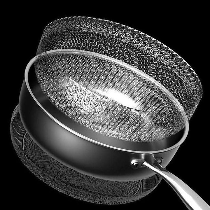 Essential stainless steel kitchen pan, perfect for frying, searing, and everyday cooking.