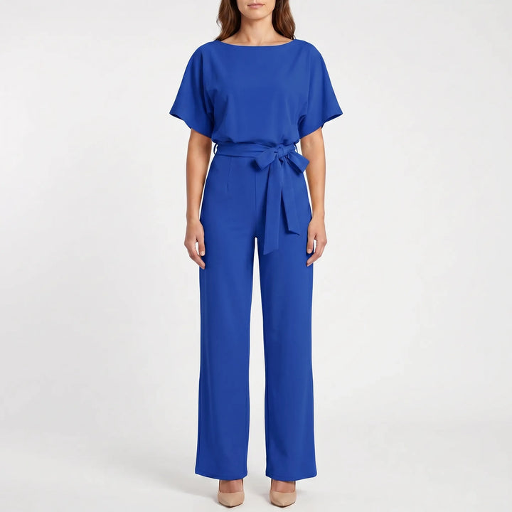 Women's fashion wide-leg jumpsuit. Comfortable one-piece with elegant batwing sleeves & a stylish keyhole back.