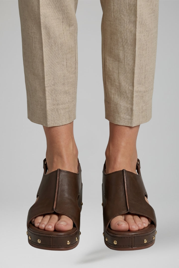 Fashionable women's slip-on platform sandals, offering elevated style & comfort for summer footwear.