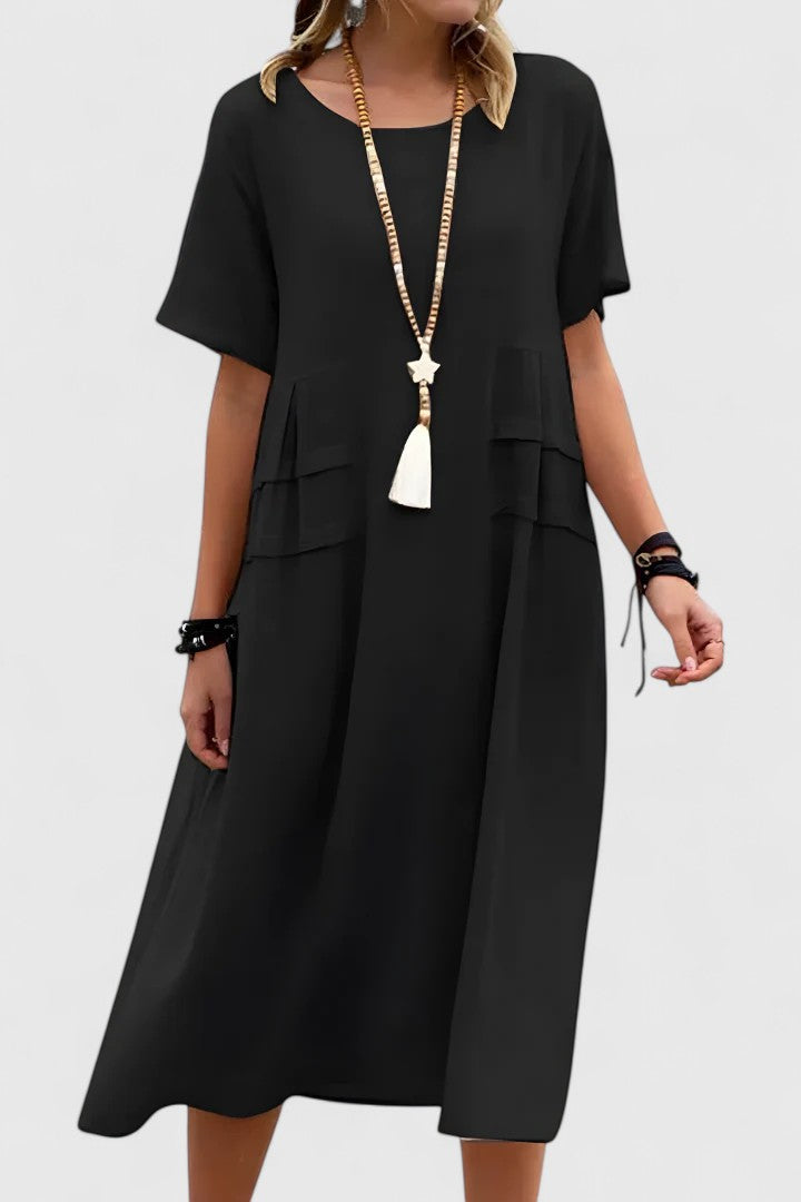 Classic women's midi dress. Elegant design and flattering fit make it a perfect party or evening dress. Chic style.