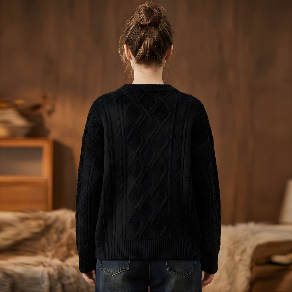 Cozy cable knit women's pullover sweater, vintage 90s style, oversized fit for casual winter wear.
