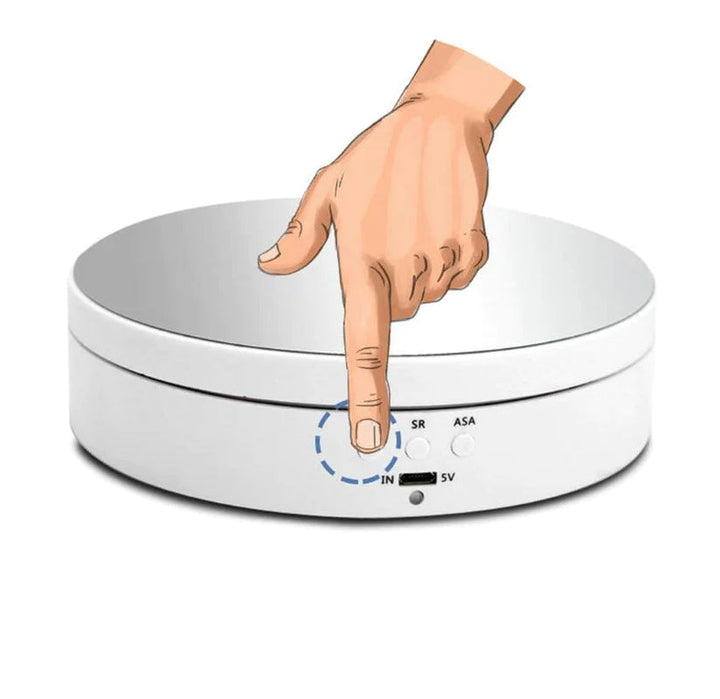"Black electric motorized rotating display stand, round base, showcasing 360° rotation for professional photography setups."