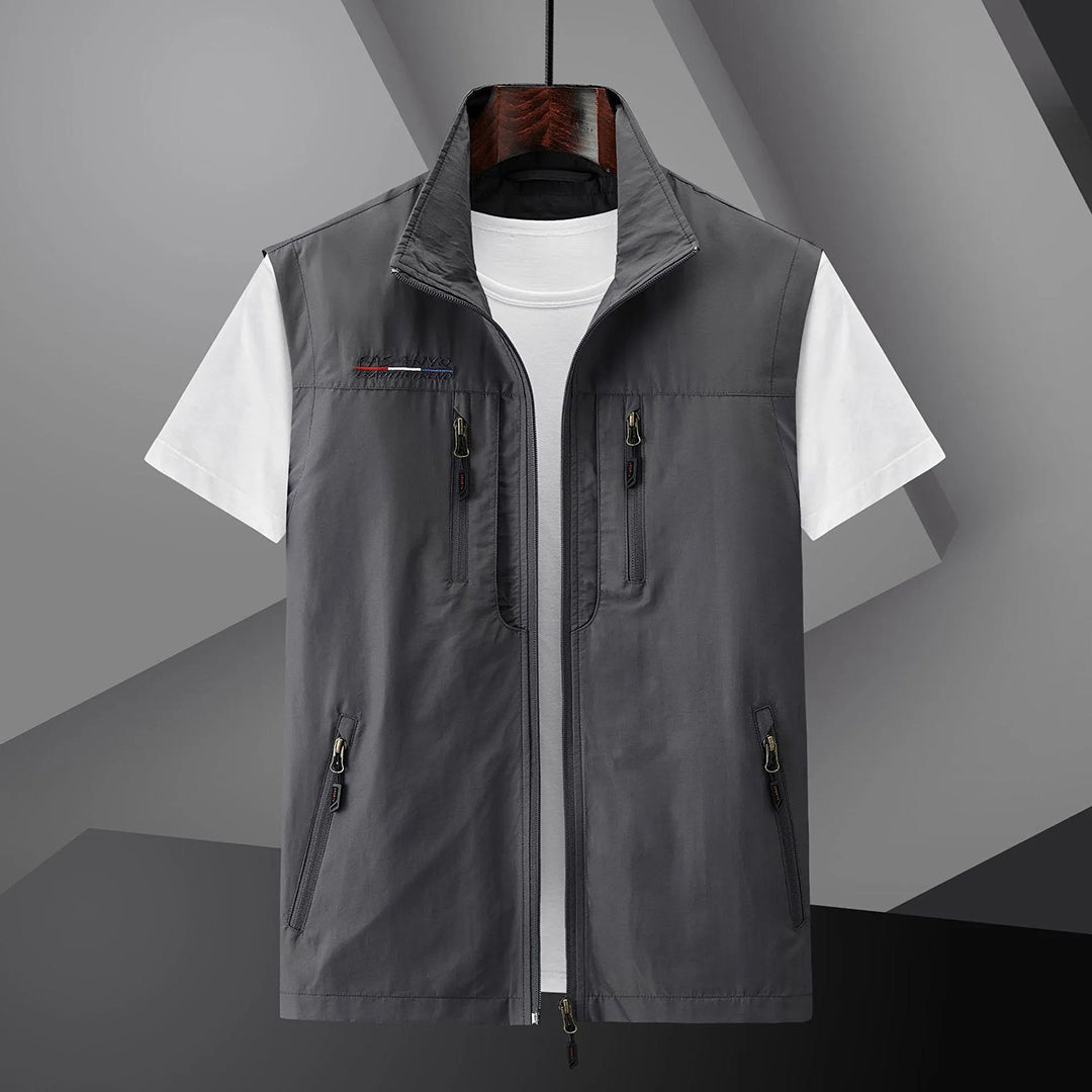 Stylish men's lightweight utility vest, multi-pocket design for essentials. Perfect for travel & outdoor fashion.