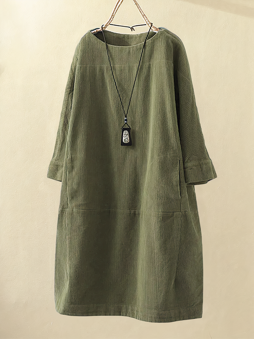 Women's cozy midi dress with pockets, round neck, elbow sleeves. Perfect for casual everyday comfort & style.