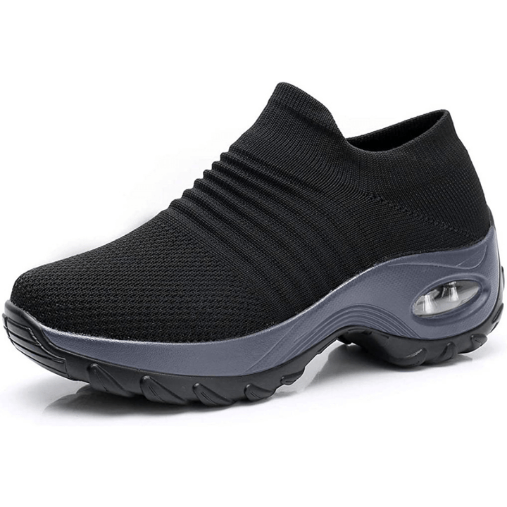 Pair of supportive women's comfort shoes, ideal for foot pain relief.