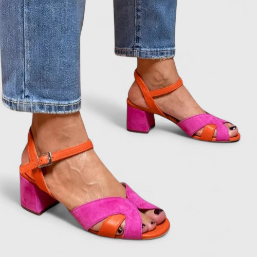 Stylish pink wedge heel casual sandals for women, offering comfortable summer footwear with an adjustable strap.
