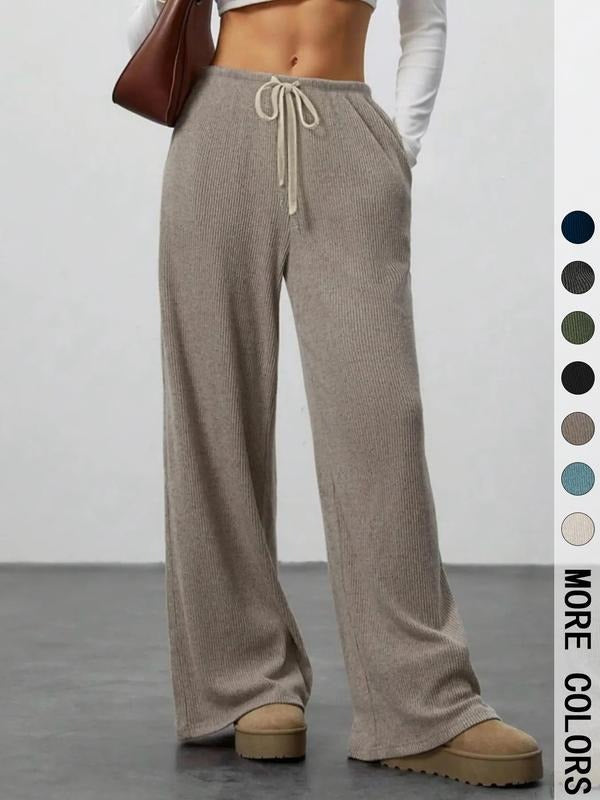 Comfortable women's ribbed knit wide-leg lounge pants with a drawstring waist, perfect for casual wear.