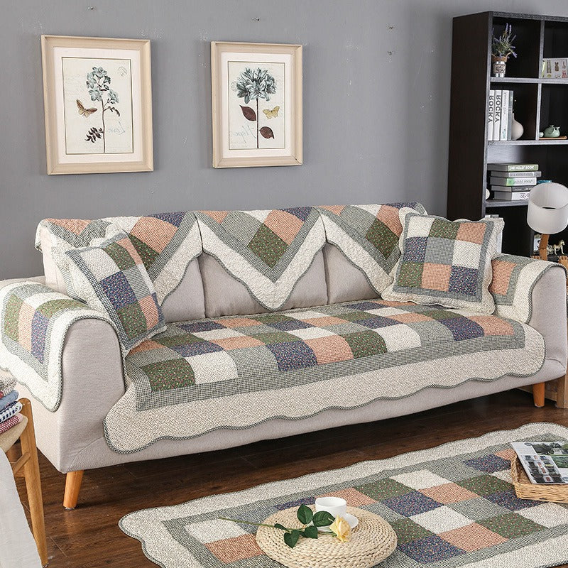 Close-up of a durable, non-slip cotton quilted furniture cover, designed for easy washing and protection.