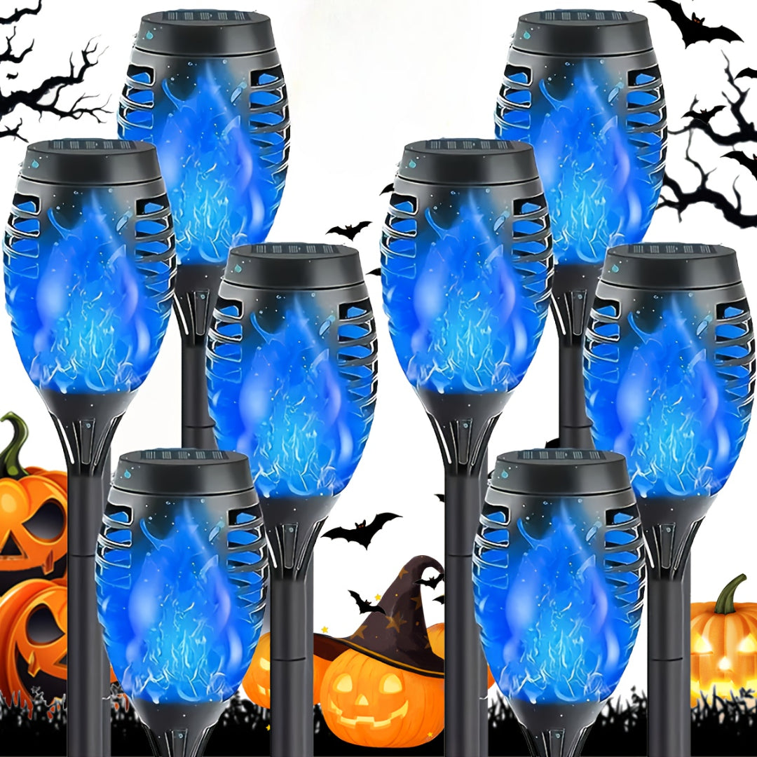 A full scene of 8 solar-powered flickering flame lights enhancing a beautiful outdoor setting.