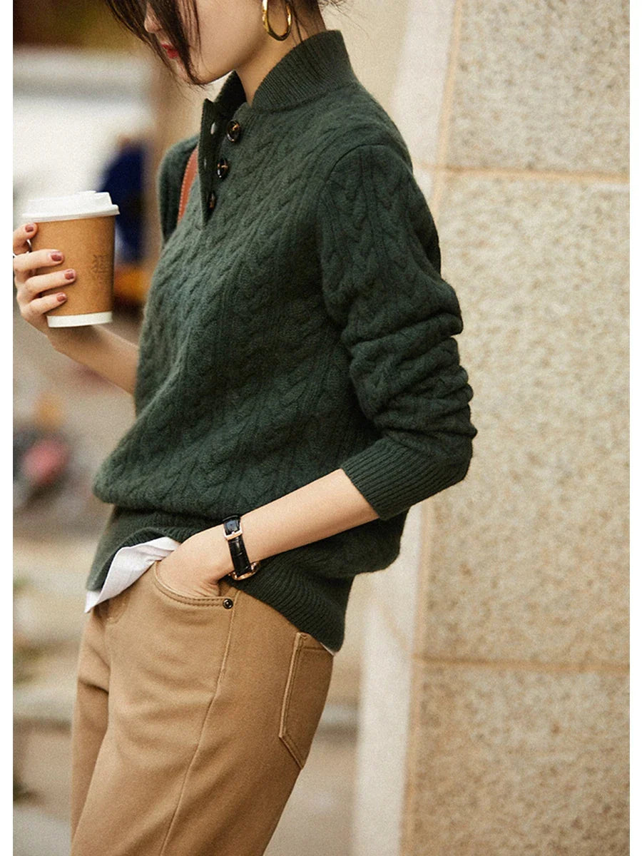 High-quality cable knit cashmere blend sweater for women, emphasizing its luxurious fabric texture