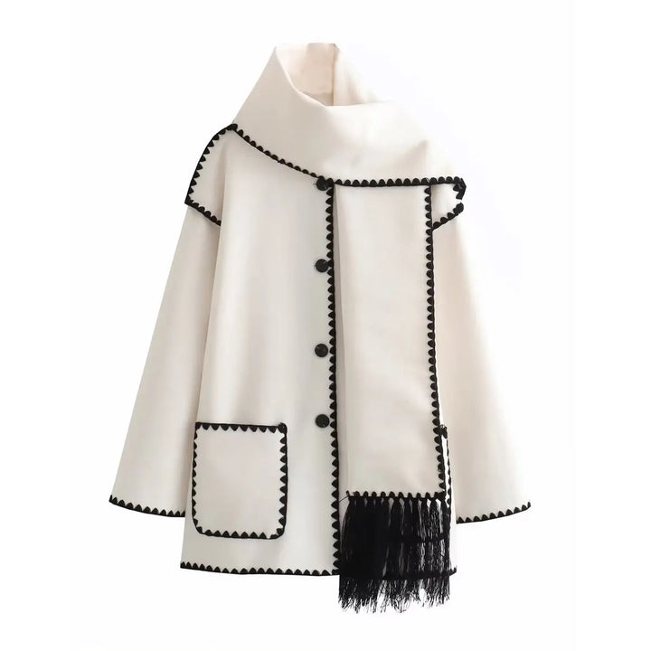 Fashionable women's wool blend wrap coat in a versatile shade, accented with a unique fringe hem