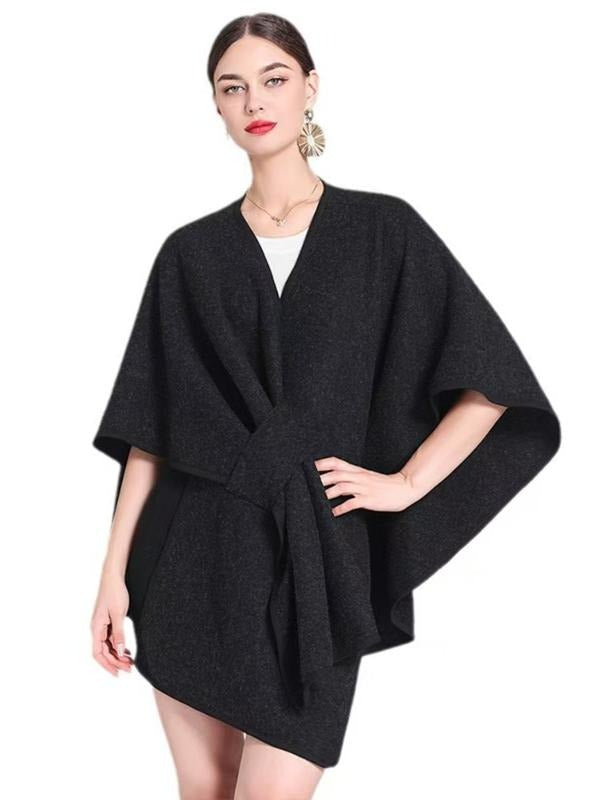 Stylish women's crepe wrap cape top in 'colorName', showcasing its unique design, side view.
