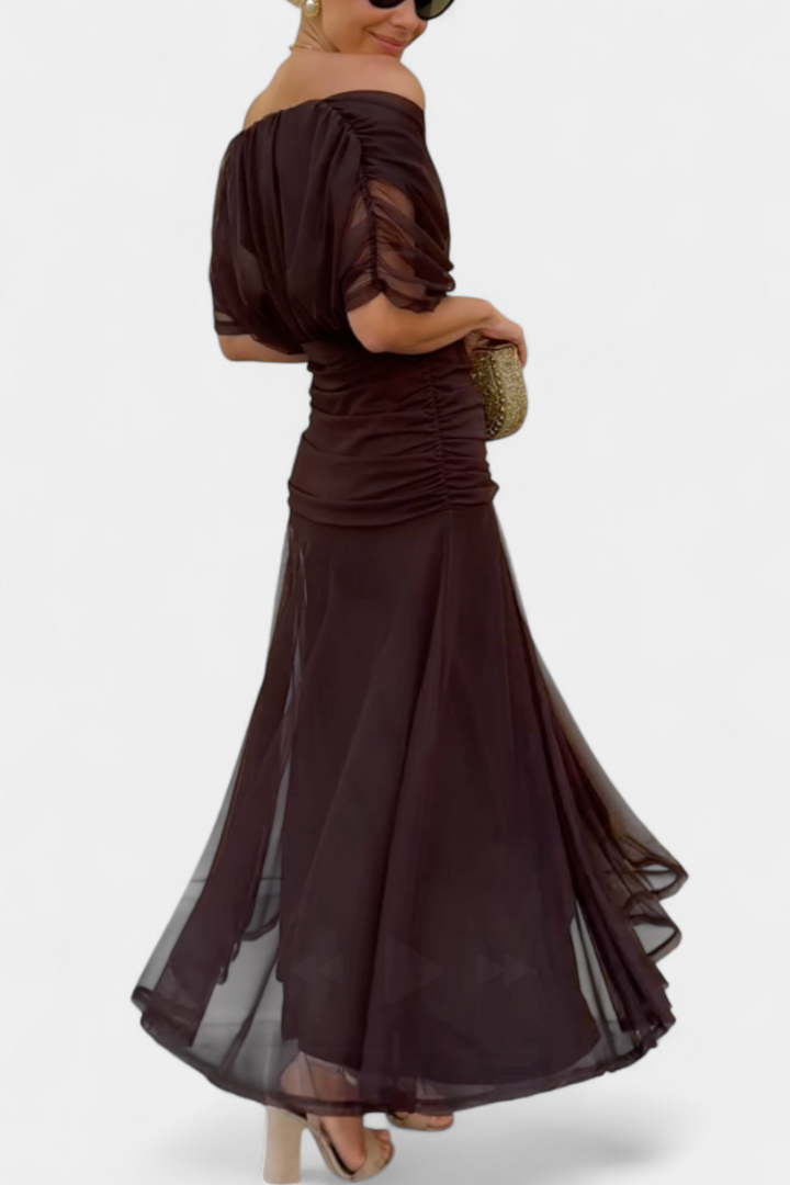 V-neck detail of a captivating women's floral maxi dress, showcasing its elegant design. Ideal for summer events.