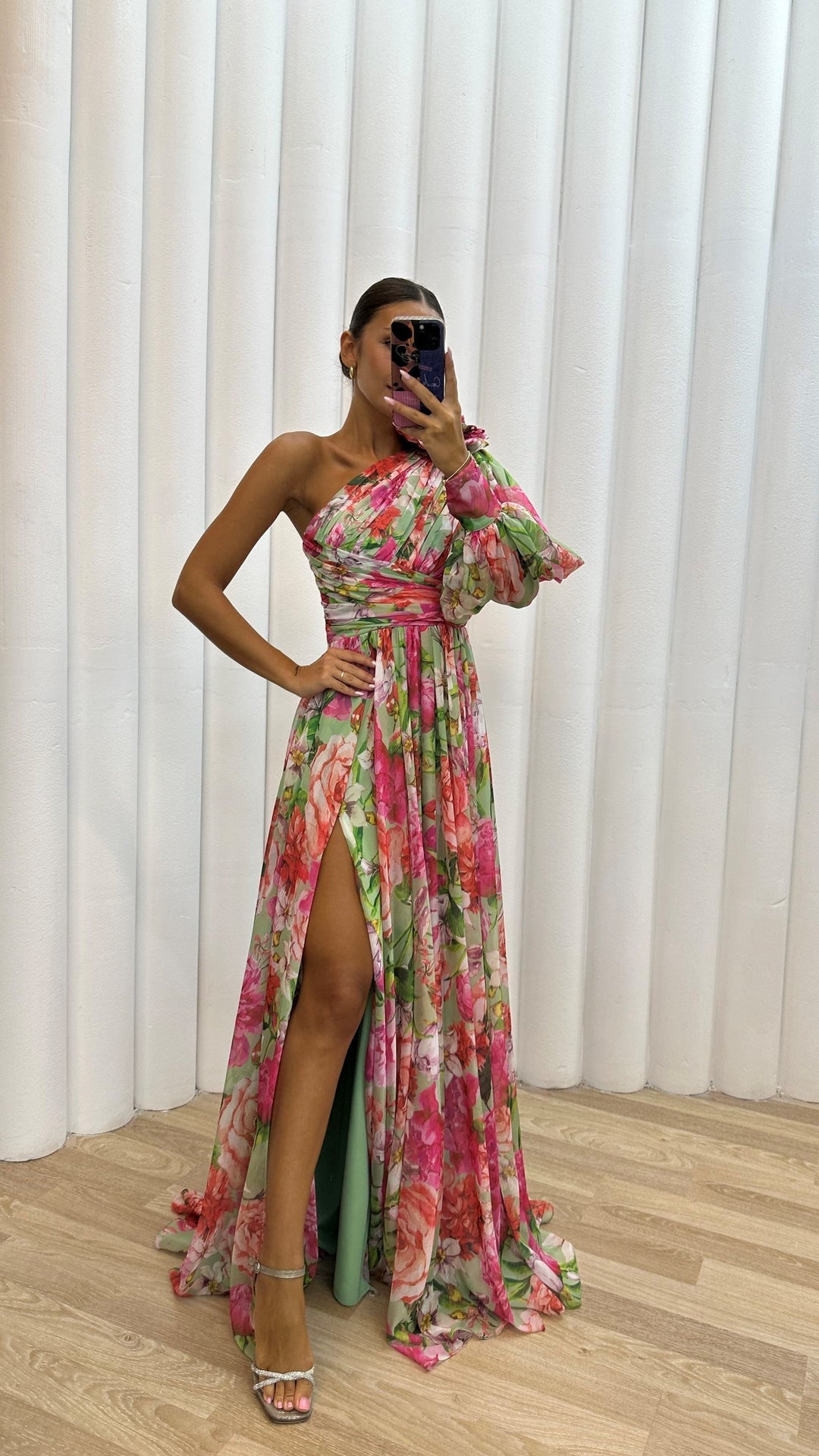Long elegant floral dress with a flattering slit, a must-have for women's occasion wear.
